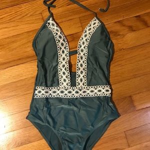 Brand new with tag, one piece bathing suit.